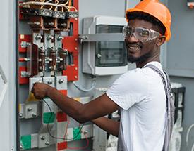 male student working on electrical meter